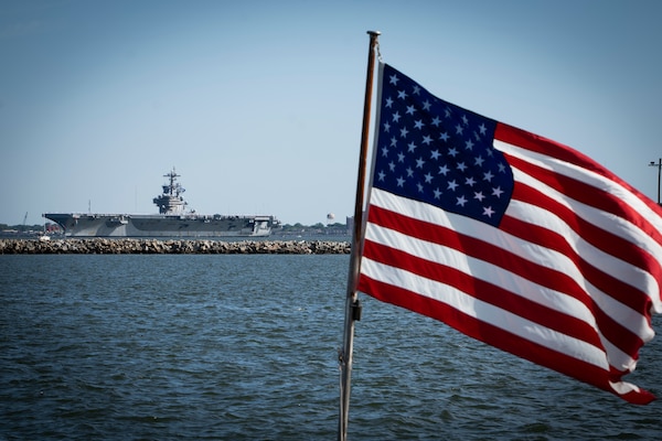 NORFOLK, Va. (April 23, 2023)  The Nimitz-class aircraft carrier USS George H.W. Bush (CVN 77), along with the staff of carrier Strike Group (CSG) 10, returns to Naval Station Norfolk following an eight-month deployment, April 23, 2023. The George H.W. Bush CSG was deployed to the U.S. Naval Forces Europe area of operations, employed by U.S. Sixth Fleet to defend U.S., allied and partner interests. (U.S. Navy photo by Mass Communication Specialist 2nd Class Anderson W. Branch)