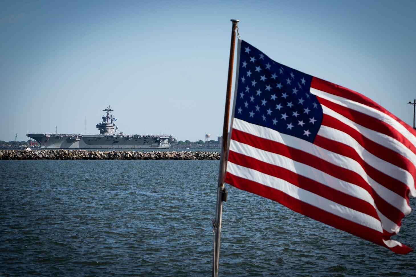 NORFOLK, Va. (April 23, 2023)  The Nimitz-class aircraft carrier USS George H.W. Bush (CVN 77), along with the staff of carrier Strike Group (CSG) 10, returns to Naval Station Norfolk following an eight-month deployment, April 23, 2023. The George H.W. Bush CSG was deployed to the U.S. Naval Forces Europe area of operations, employed by U.S. Sixth Fleet to defend U.S., allied and partner interests. (U.S. Navy photo by Mass Communication Specialist 2nd Class Anderson W. Branch)