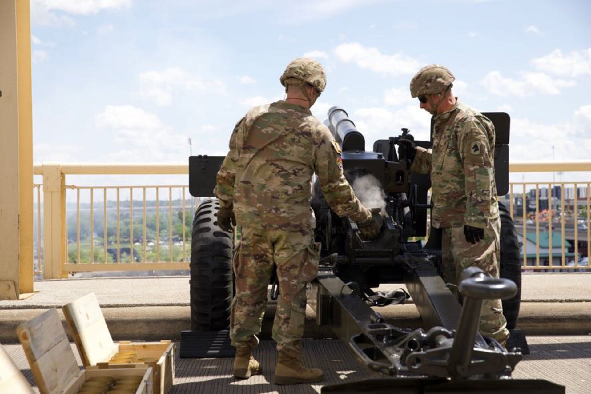 The 138th Field Artillery Brigade Soldiers fire their 105mm Howitzer cannons from the Clark Memorial Bridge as part of their role in Thunder Over Louisville, April 22, 2023. Thunder Over Louisville is an annual event as part of the Derby Festival. (U.S. Army National Guard photo by Pfc. Georgia Napier.)