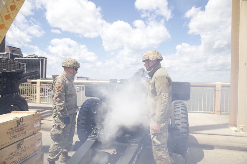 Soldiers from the 138th Field Artillery Brigade fire their 105mm Howitzer cannons on the Clark Memorial Bridge as part of their opening ceremonies for Thunder Over Louisville, April 22, 2023. The soliders were firing the cannons to the national anthem lyric "The bombs bursting in air." (U.S. Army National Guard photo by Pfc. Georgia Napier.)
