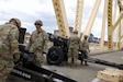 The 138th Field Artillery Brigade played a role in Thunder Over Louisville by firing their 105mm Howitzer cannons from the Clark Memorial Bridge in sync with the National Anthem. April 22, 2023. This was the 34th Thunder that has been held. (U.S. Army National Guard photo by Pfc. Georgia Napier.)