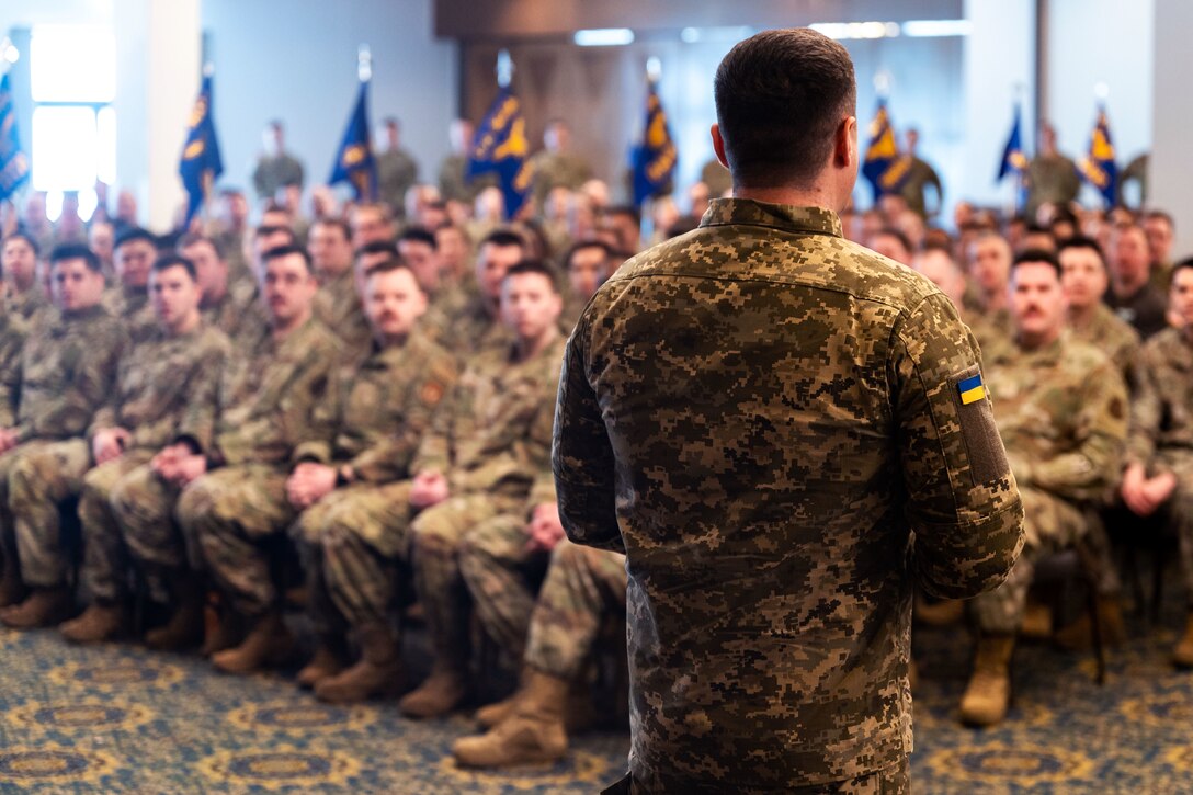 A senior officer speaks to service members.