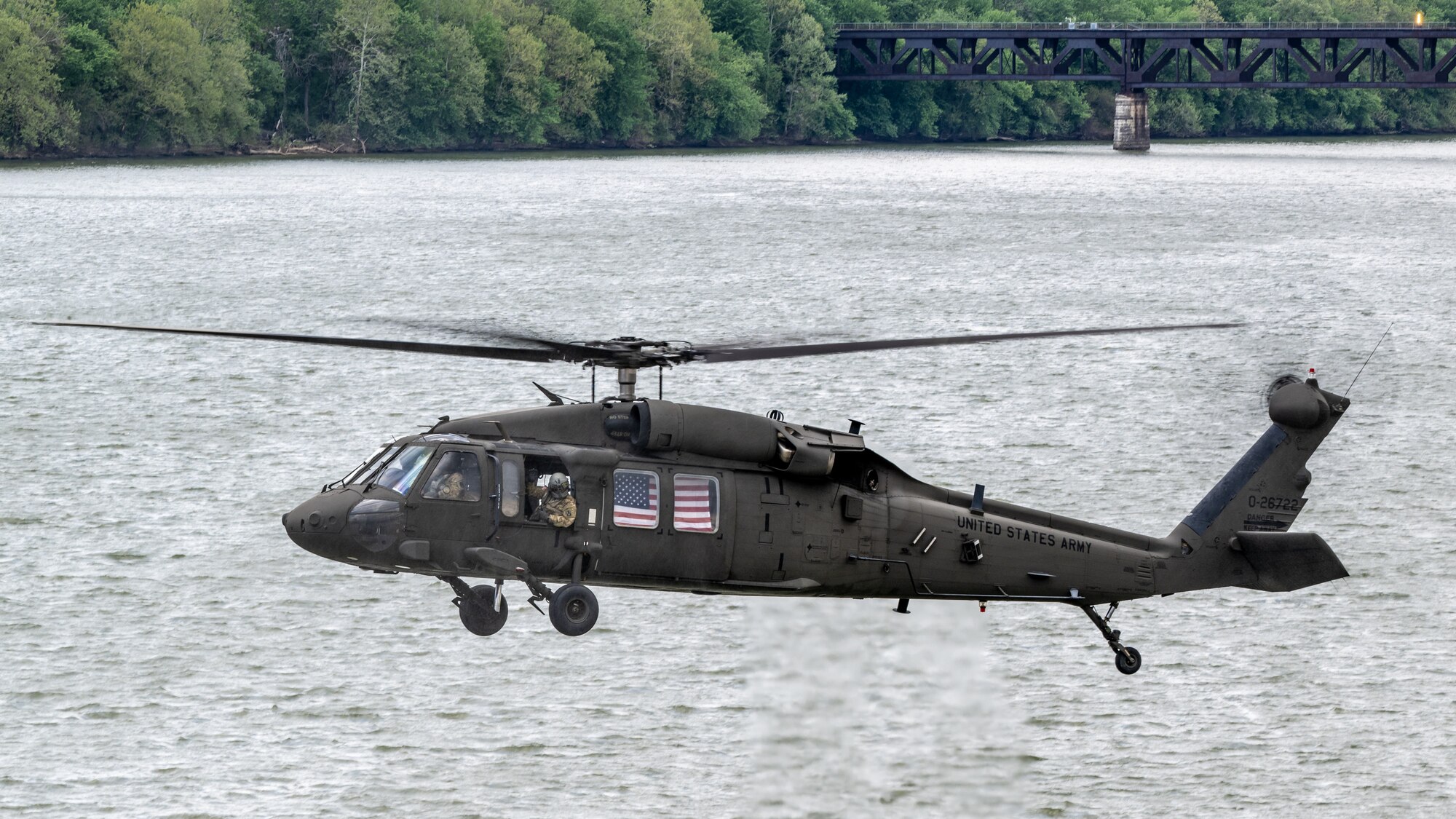 A U.S. Army UH-60 Black Hawk from the 229th Aviation Regiment at Fort Knox, Ky., performs an aerial demonstration along the banks of the Ohio River in downtown Louisville, Ky., April 22, 2023, as part of the annual Thunder Over Louisville air show. This year’s event featured more than 20 military and civilian planes, including a C-130J Super Hercules from the Kentucky Air National Guard, which served as the base of operations for military aircraft participating in the show. (U.S. Air National Guard photo by Dale Greer)