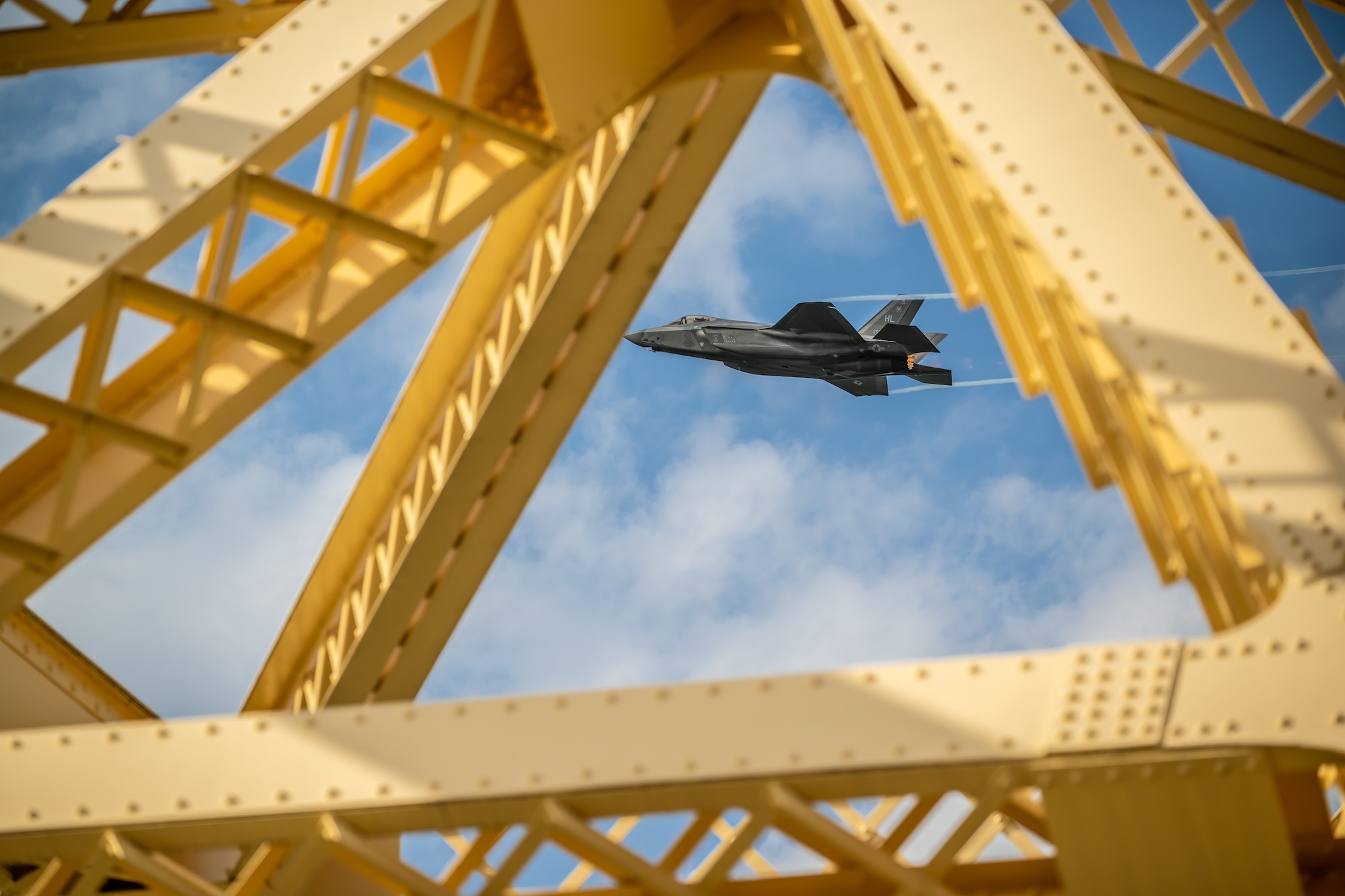 An aircraft from the U.S. Air Force F-35A Lightning II Demo Team, piloted by Maj. Kristin Wolfe, performs an aerial demonstration along the banks of the Ohio River in downtown Louisville, Ky., April 22, 2023, as part of the annual Thunder Over Louisville air show. This year’s event featured more than 20 military and civilian planes, including a C-130J Super Hercules from the Kentucky Air National Guard, which served as the base of operations for military aircraft participating in the show. (U.S. Air National Guard photo by Dale Greer)