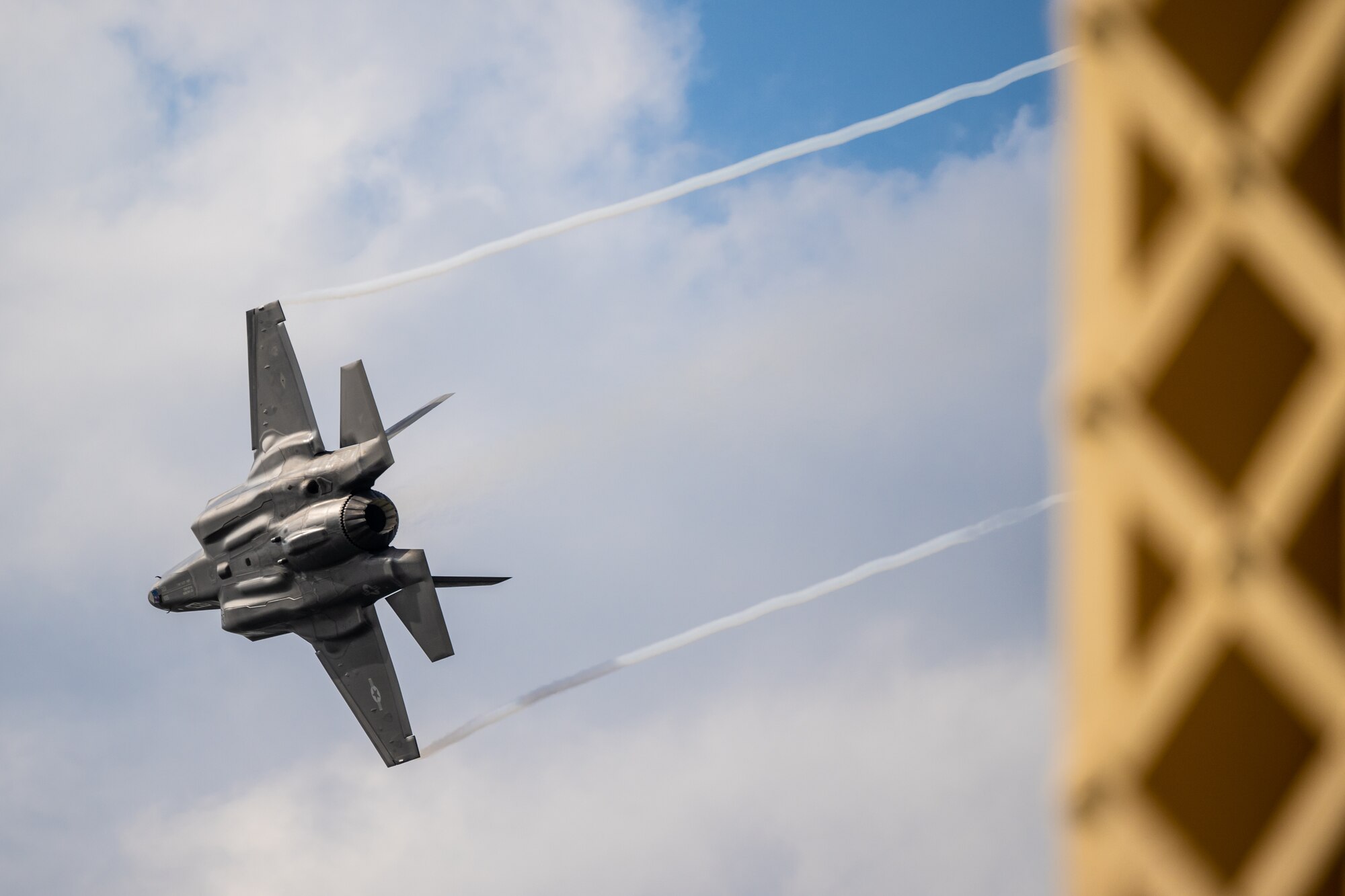 An aircraft from the U.S. Air Force F-35A Lightning II Demo Team, piloted by Maj. Kristin Wolfe, performs an aerial demonstration along the banks of the Ohio River in downtown Louisville, Ky., April 22, 2023, as part of the annual Thunder Over Louisville air show. This year’s event featured more than 20 military and civilian planes, including a C-130J Super Hercules from the Kentucky Air National Guard, which served as the base of operations for military aircraft participating in the show. (U.S. Air National Guard photo by Dale Greer)