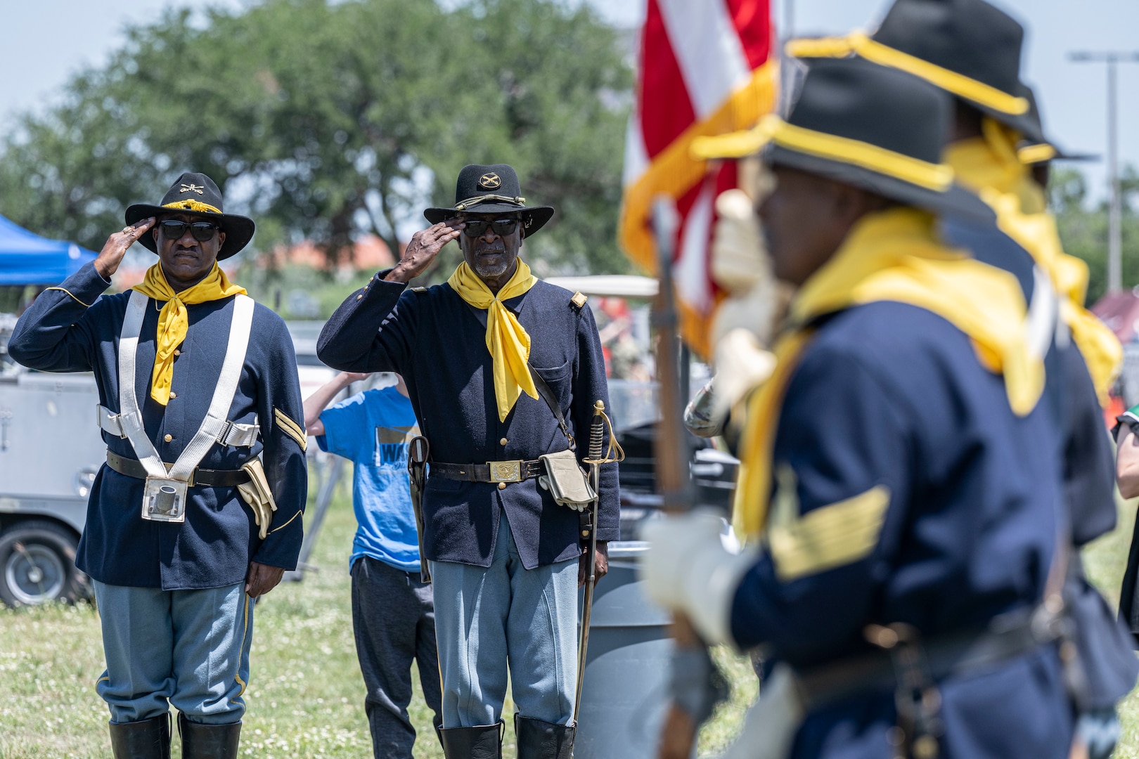 Buffalo Soldiers saluting.