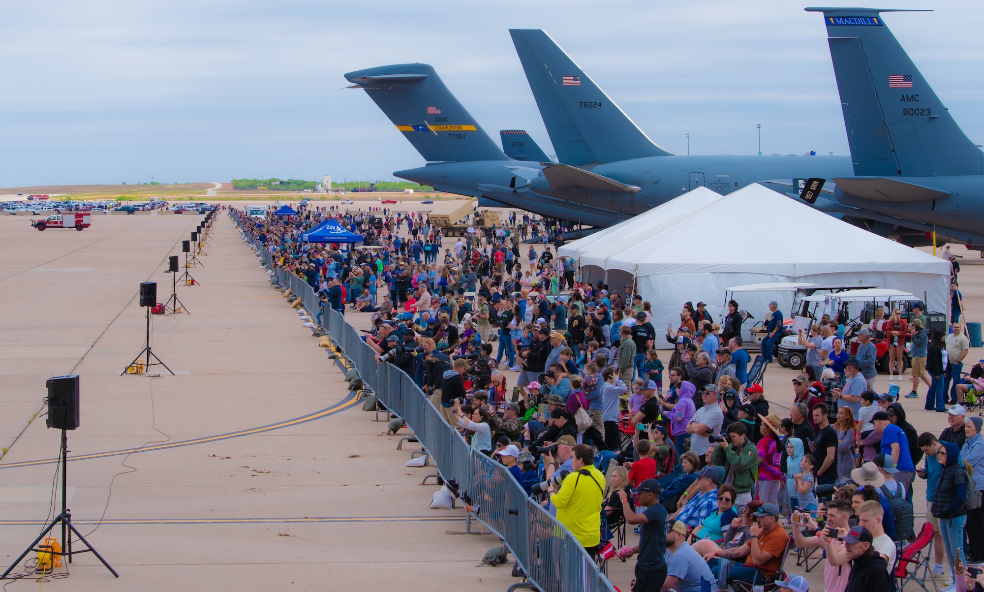 Air show attendees observe static displays during the 2023 Dyess Big Country Air Fest on Dyess Air Force Base, Texas, April 22, 2023. More than 30,000 event goers attended the one-day event highlighting the best of America’s only Lift and Strike base, Air Force heritage and Dyess community partners. The air show featured the F-22 Raptor demo team, U.S. Air Force Academy Wings of Blue, U.S. Army Golden Knights, WW II heritage flight and B-1B Lancer and C-130J Super Hercules fly overs. (U.S. Air Force photo by Airman 1st Class Alondra Cristobal Hernandez)