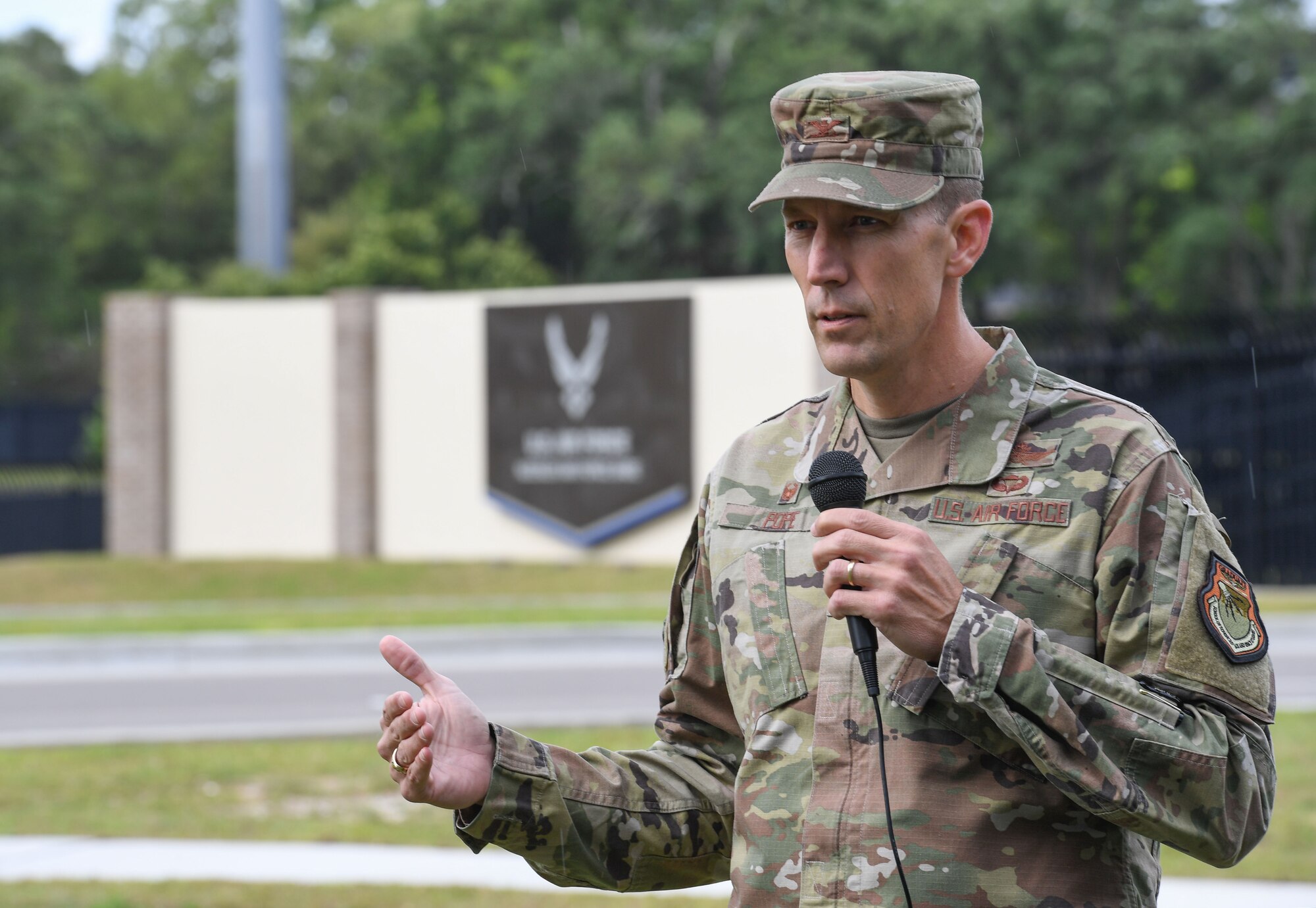 U.S. Air Force Col. Billy Pope, 81st Training Wing commander, delivers remarks during a tree planting ceremony near the Division Street Gate at Keesler Air Force Base, Mississippi, April 24, 2023.