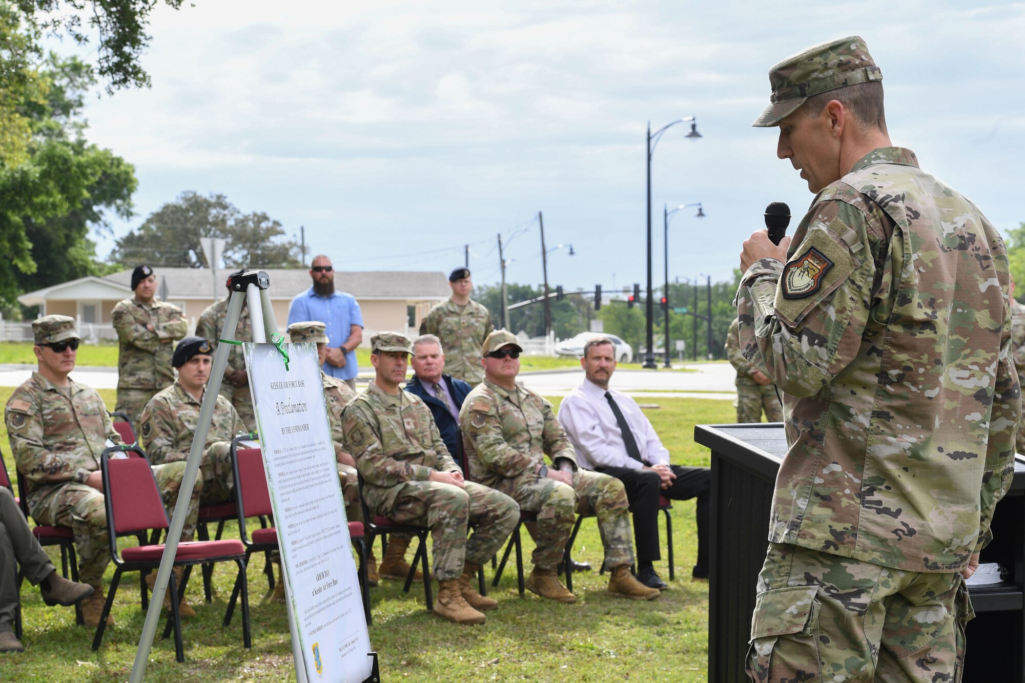 U.S. Air Force Col. Billy Pope, 81st Training Wing commander, reads the Arbor Day proclamation during a tree planting ceremony near the Division Street Gate at Keesler Air Force Base, Mississippi, April 24, 2023.