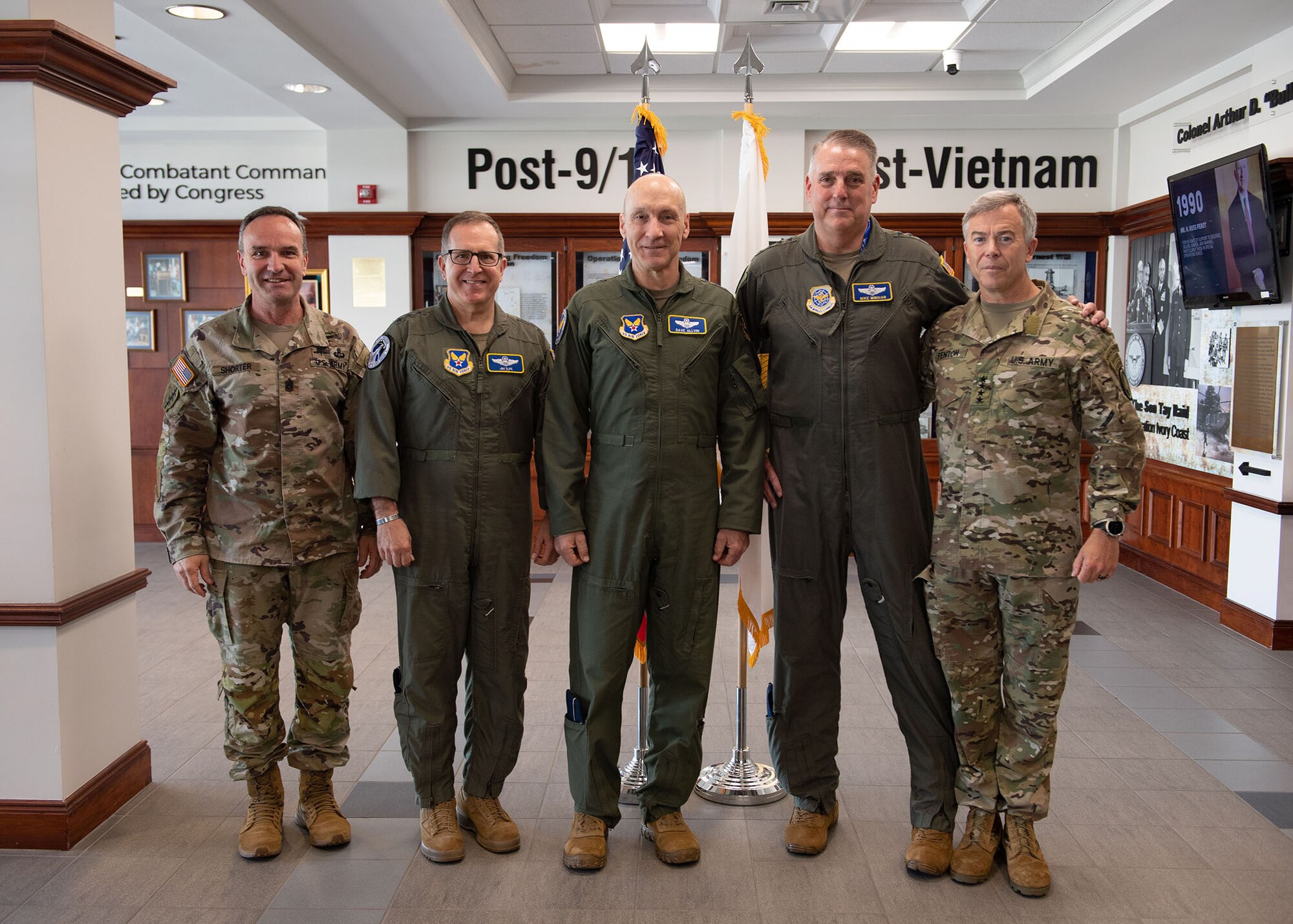 From right to left, Gen. Bryan Fenton, commander of U.S. Special Operations Command, Gen. Mike Minihan, commander of Air Mobility Command, Gen. David Allvin, Air Force Vice Chief of Staff, Lt. Gen. James Slife, deputy chief of staff for operations, Headquarters United States Air Force, Command Sgt. Maj. Shane Shorter, senior enlisted leader of U.S. Special Operations Command, join for a group photo during Phoenix Rally at MacDill Air Force Base, Florida, April 20, 2023. Spring Phoenix Rally brought together more than 250 Total Force Mobility Air Force leaders and spouses to ensure the Mobility Air Force is ready to deliver Rapid Global Mobility across the Joint Force. (Courtesy Photo)