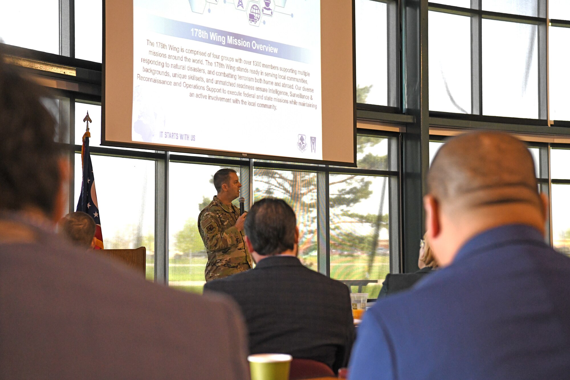 Commander of the 178th Wing, Col. Ken Kazmaier, opens an informational brief during the wing's Community Day, April 20, 2023 in Springfield, Ohio. The event consisted of a briefing on the wing's capabilities and a base tour. (U.S. Air National Guard photo by Senior Airman Jill Maynus)