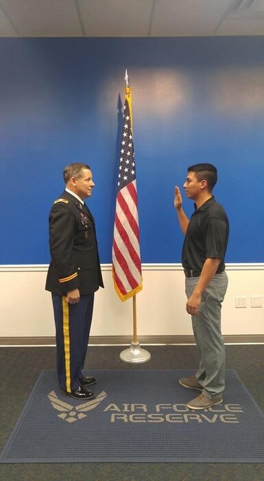Tech. Sgt. Ricardo Miranda-Navarro takes the Oath of Office at the local recruiters office prior to attending Base Military Training in 2017 near Kansas City, Mo.