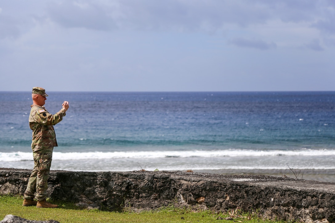 U.S. Army Col. Shawn Fullenbach, chief of staff of the Utah National Guard, takes a photograph of Guam’s scenery during the first-ever Region VII Chief of Staff Advisory Council Conference in Hagatna, Guam May 18, 2022.  The meeting, hosted by the Guam National Guard, served to familiarize other National Guard leaders in the region with the uniqueness of Guam’s operational and cultural environment.