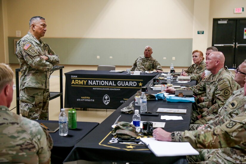 U.S. Army Brig. Gen. Michael Cruz, adjutant general of the Guam National Guard, gives opening remarks at the first-ever Region VII Chiefs of Staff Advisory Council at the Guard's Barrigada Readiness Complex, April 18, 2023.  Cruz thanked the visitors for making the long trip to better understand the physical and cultural concerns regarding the isolated U.S. Territory, which is home to 160,000 U.S. citizens living in the second island chain.