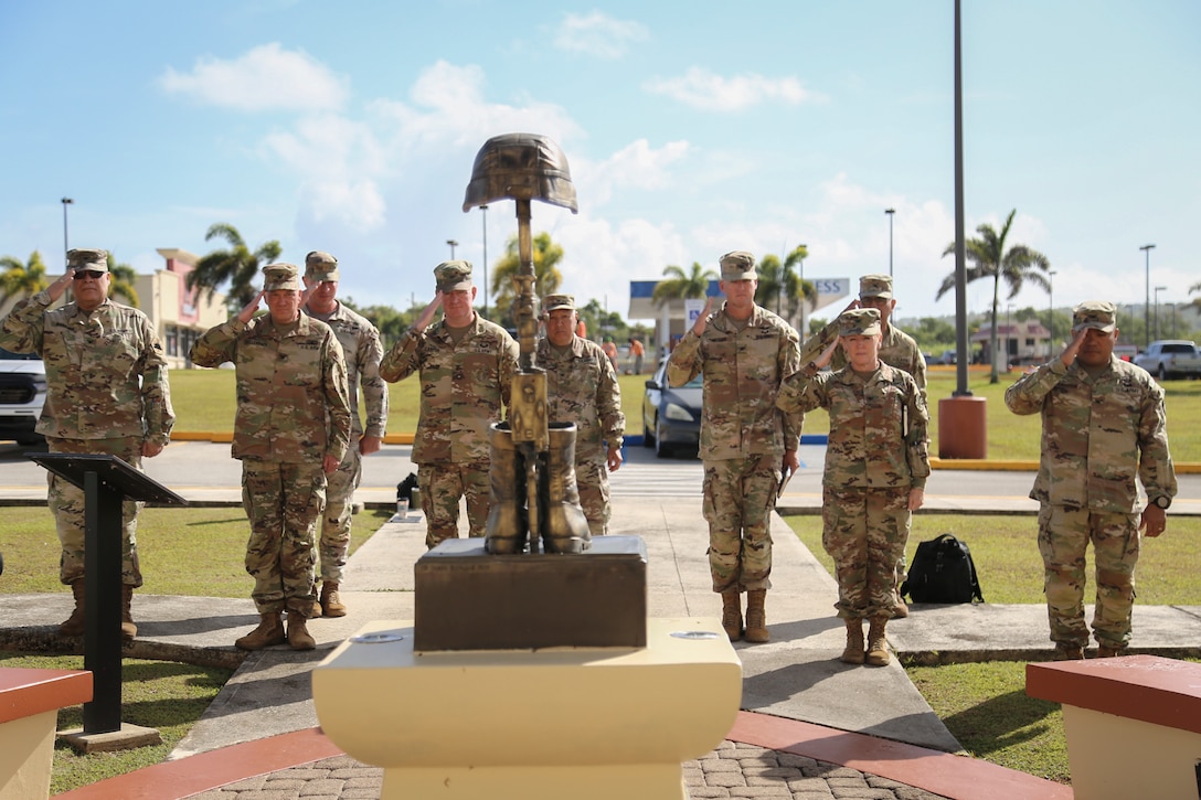 National Guard chiefs of staff from Region VII render a solemn salute at the Guam National Guard Fallen Heroes Memorial in Barrigada, April 18, 2023. The delegation spent three days on the island to discuss regional issues, share best practices, and gain a better understanding of the uniqueness of Guam's operational and cultural environment.