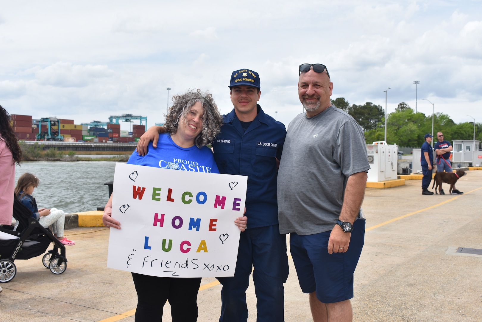 U.S. Coast Guard Seaman Luca Columbano's family greets him pier side at the USCGC Forward's (WMEC 911) return to home port April 23, 2023, following a multi-week training exercise and counterdrug deployment in the central Caribbean Sea. While underway in the Seventh Coast Guard District's area of responsibility and in support of Joint Interagency Task Force–South, Forward traveled more than 6,000 miles conducting counterdrug operations as part of a multi-faceted approach to combatting illicit narcotics trafficking across maritime borders. (U.S. Coast Guard photo by Ensign Olivia Anthony)