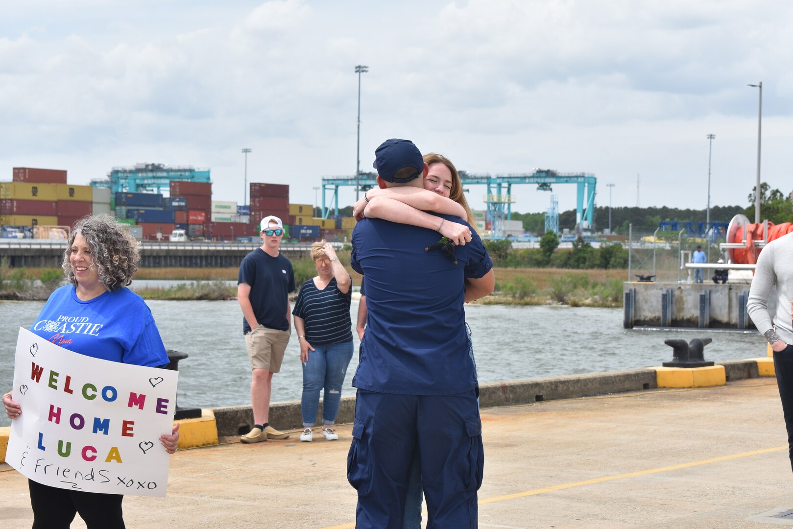 Family members greet the crew of the USCGC Forward (WMEC 911) at the cutter's return to home port in Portsmouth, April 22, 2023, following a multi-week training exercise and counterdrug deployment in the central Caribbean Sea. While underway in the Seventh Coast Guard District's area of responsibility and in support of Joint Interagency Task Force–South, Forward traveled more than 6,000 miles conducting counterdrug operations as part of a multi-faceted approach to combatting illicit narcotics trafficking across maritime borders. (U.S. Coast Guard photo by Ensign Olivia Anthony)