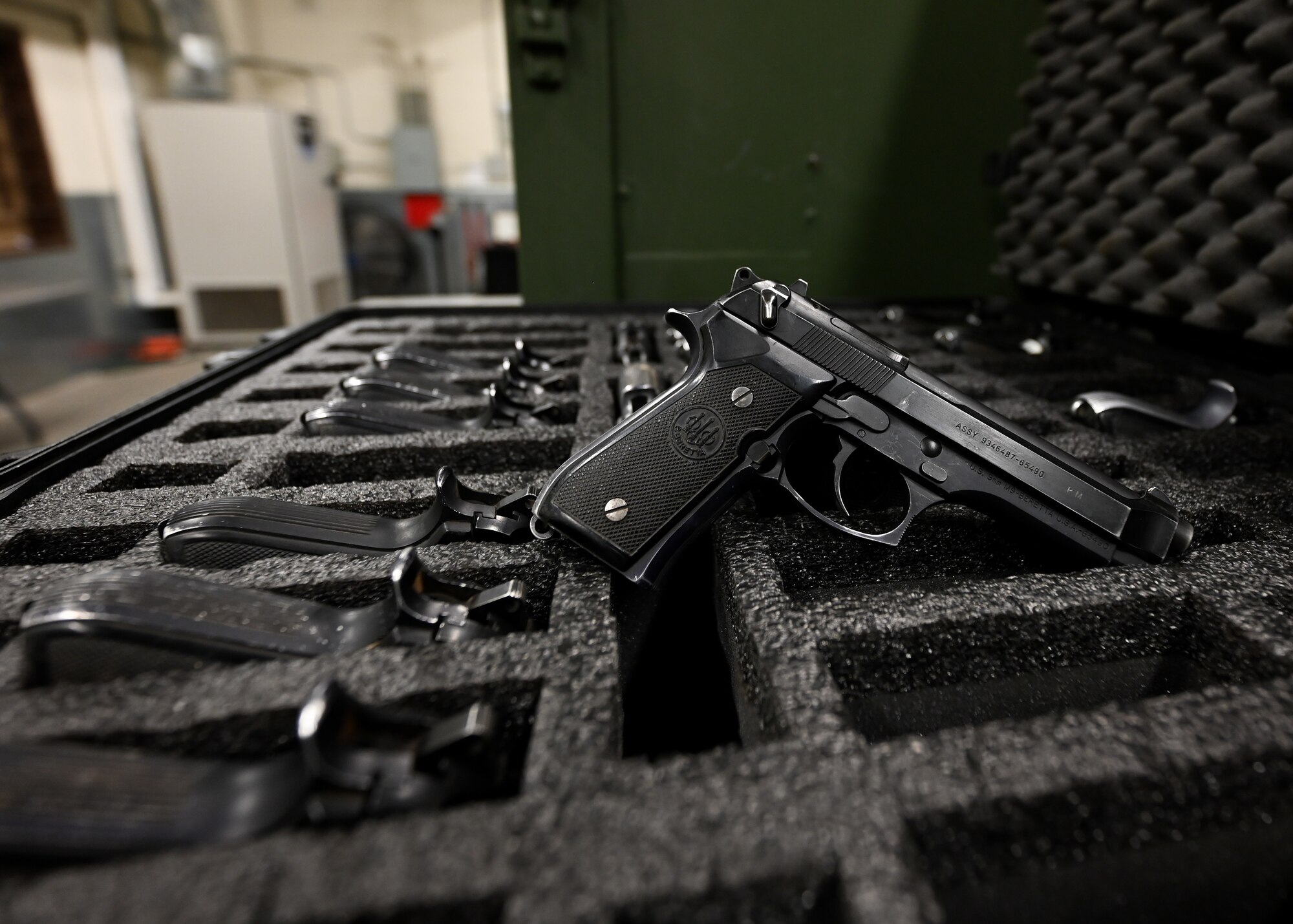 Firearms are stored in a crate.