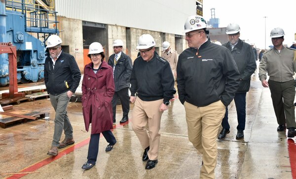 BATH, Maine (April 24, 2023) - Chief of Naval Operations Adm. Mike Gilday, Sen. Susan Collins and Sen. Angus King visit with leadership during a tour of General Dynamics Bath Iron Works, April 24. They also visited Orion Training Academy and met with Sailors aboard the future USS Carl M. Levin (DDG 120) during their visit to Bath, Maine. (U.S. Navy photo by Cmdr. Courtney Hillson)