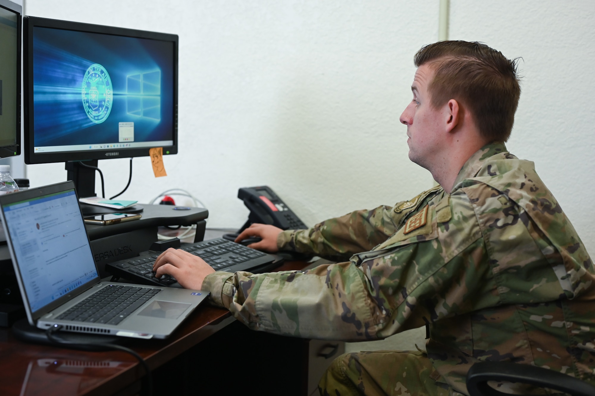 U.S. Air Force Senior Airman Zain Creamer, 47th Communications Squadron knowledge management technician, types on a computer at Laughlin Air Force Base, Texas, on April 17, 2023. The records management program is designed to ensure that records are preserved, and safeguards are in place to prevent illegal removal, loss, or destruction of records. (U.S. Air Force photo by Airman 1st Class Keira Rossman)