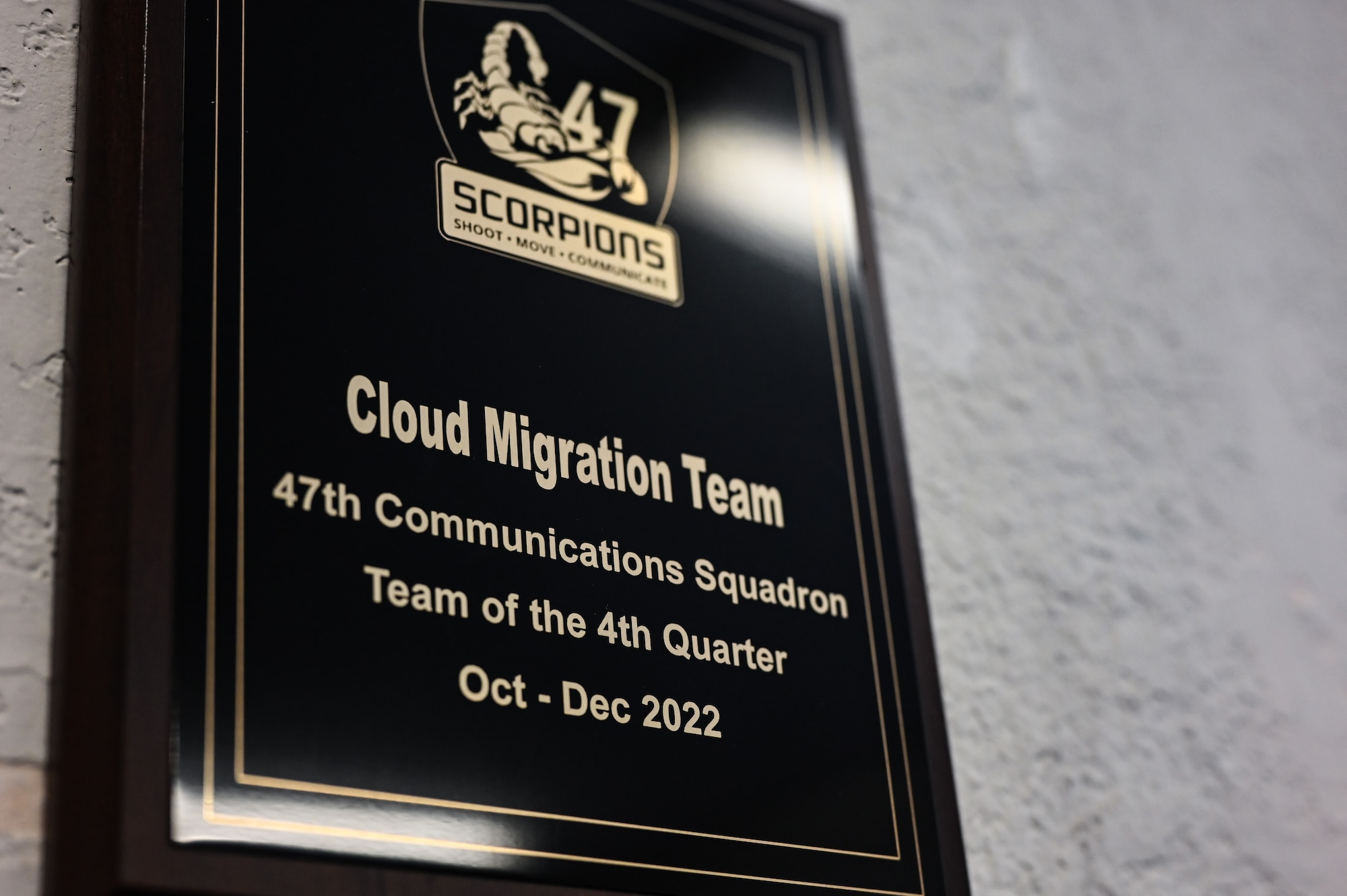 U.S. Air Force photo of a cloud migration team accolade awarded to the 47th Communications Squadron at Laughlin Air Force Base, Texas, on April 17, 2023. The records management program, which falls under the Communications squadron, aims to dispose of temporary value records promptly and systematically while adhering to legal and regulatory requirements. (U.S. Air Force photo by Airman 1st Class Keira Rossman)