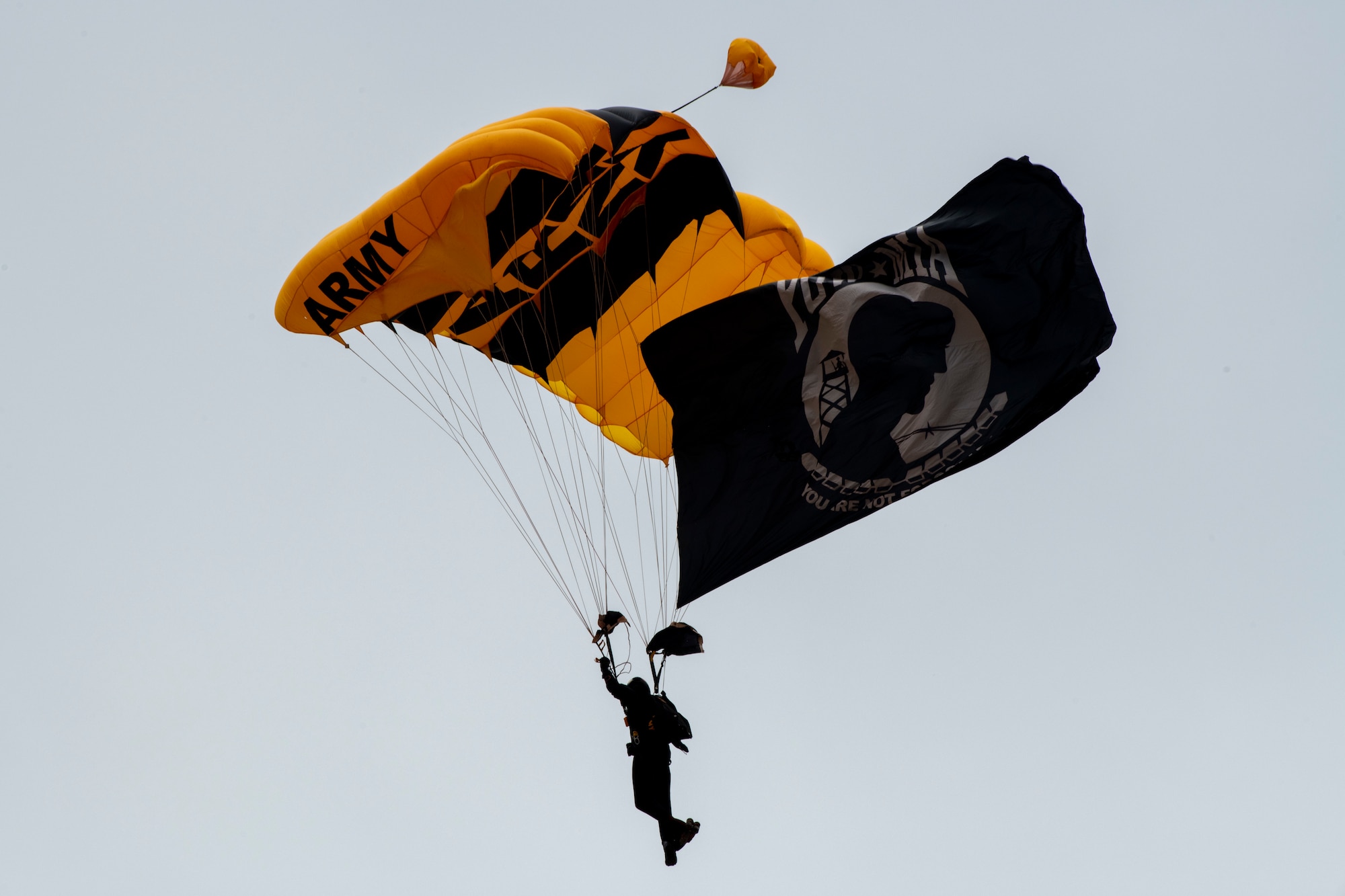 The U.S. Army Golden Knights perform during the 2023 Dyess Big Country Air Fest on Dyess Air Force Base, Texas, April 22, 2023. More than 30,000 event goers attended the one-day event highlighting the best of America’s only Lift and Strike base, Air Force heritage and Dyess community partners. The air show featured the F-22 Raptor demo team, U.S. Air Force Academy Wings of Blue, U.S. Army Golden Knights, WW II heritage flight and B-1B Lancer and C-130J Super Hercules fly overs. (U.S. Air Force photo by Senior Airman Mercedes Porter)