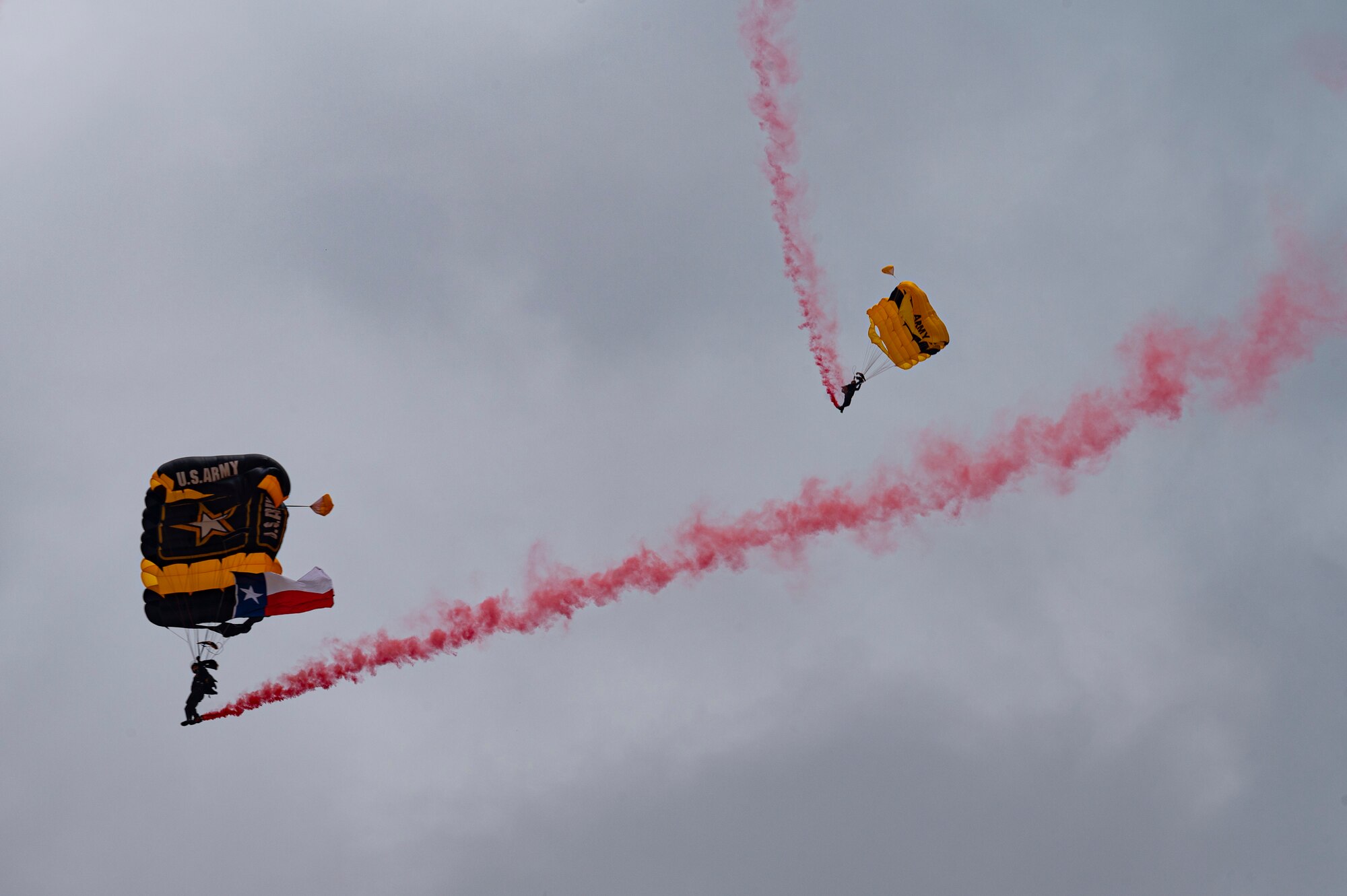 The U.S. Army Golden Knights perform during the 2023 Dyess Big Country Air Fest on Dyess Air Force Base, Texas, April 22, 2023. More than 30,000 event goers attended the one-day event highlighting the best of America’s only Lift and Strike base, Air Force heritage and Dyess community partners. The air show featured the F-22 Raptor demo team, U.S. Air Force Academy Wings of Blue, U.S. Army Golden Knights, WWII heritage flight and B-1B Lancer and C-130J Super Hercules fly overs. (U.S. Air Force photo by Senior Airman Josiah Brown)