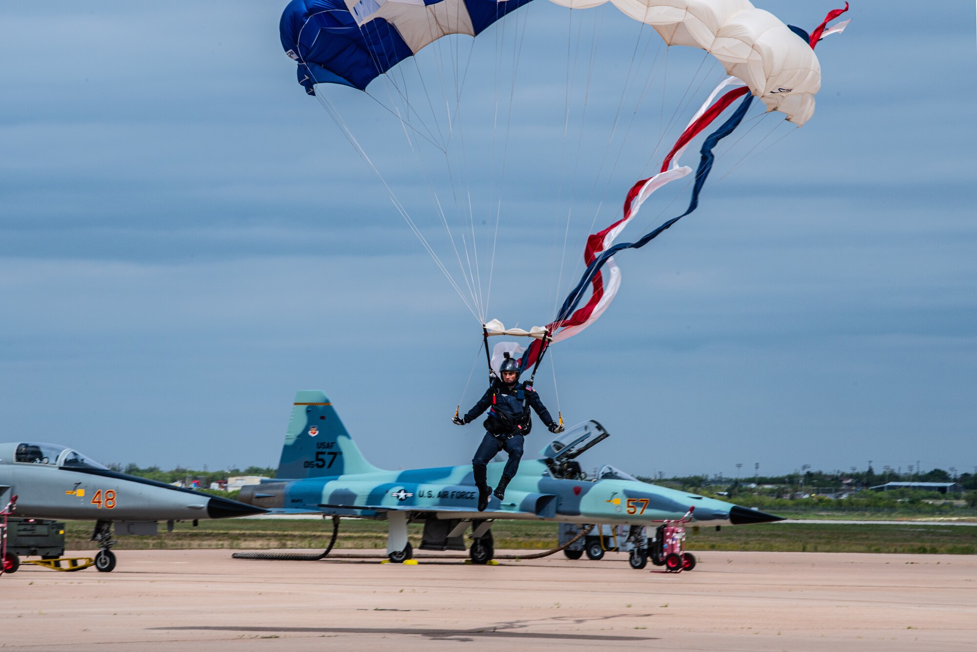 The U.S. Air Force Academy Wings of Blue team performs during the 2023 Dyess Big Country Air Fest on Dyess Air Force Base, Texas, April 22, 2023. More than 30,000 event goers attended the one-day event highlighting the best of America’s only Lift and Strike base, Air Force heritage and Dyess community partners. The air show featured the F-22 Raptor demo team, U.S. Air Force Academy Wings of Blue, U.S. Army Golden Knights, WW II heritage flight and B-1B Lancer and C-130J Super Hercules fly overs. (U.S. Air Force photo by Airman 1st Class Alondra Cristobal Hernandez)