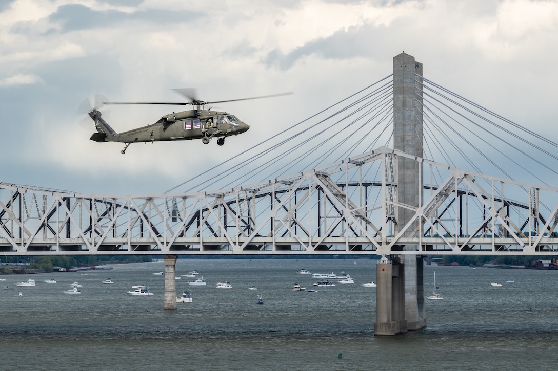 A U.S. Army UH-60 Black Hawk from the 229th Aviation Regiment at Fort Knox, Ky., performs an aerial demonstration along the banks of the Ohio River in downtown Louisville, Ky., April 22, 2023, as part of the annual Thunder Over Louisville air show. This year’s event featured more than 20 military and civilian planes, including a C-130J Super Hercules from the Kentucky Air National Guard, which served as the base of operations for military aircraft participating in the show. (U.S. Air National Guard photo by Dale Greer)