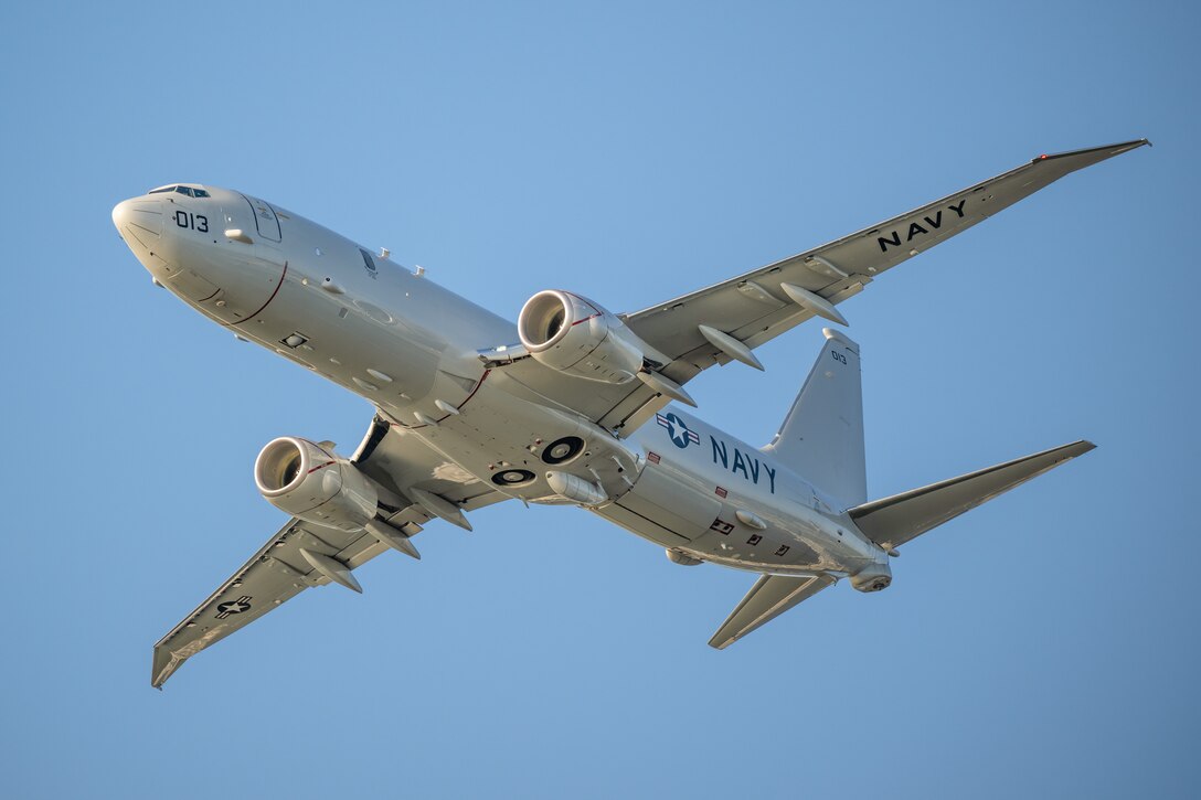 A U.S. Navy P-8 Poseidon anti-submarine aircraft from Naval Air Station Patuxent River, Md., performs an aerial demonstration along the banks of the Ohio River in downtown Louisville, Ky., April 22, 2023, as part of the annual Thunder Over Louisville air show. This year’s event featured more than 20 military and civilian planes, including a C-130J Super Hercules from the Kentucky Air National Guard, which served as the base of operations for military aircraft participating in the show. (U.S. Air National Guard photo by Dale Greer)