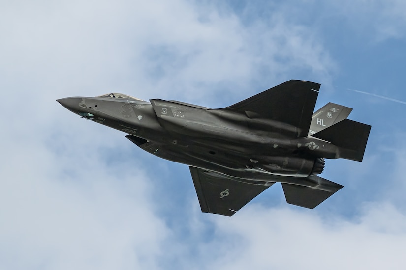 An aircraft from the U.S. Air Force F-35A Lightning II Demo Team, piloted by Maj. Kristin Wolfe, performs an aerial demonstration along the banks of the Ohio River in downtown Louisville, Ky., April 22, 2023, as part of the annual Thunder Over Louisville air show. This year’s event featured more than 20 military and civilian planes, including a C-130J Super Hercules from the Kentucky Air National Guard, which served as the base of operations for military aircraft participating in the show. (U.S. Air National Guard photo by Dale Greer)