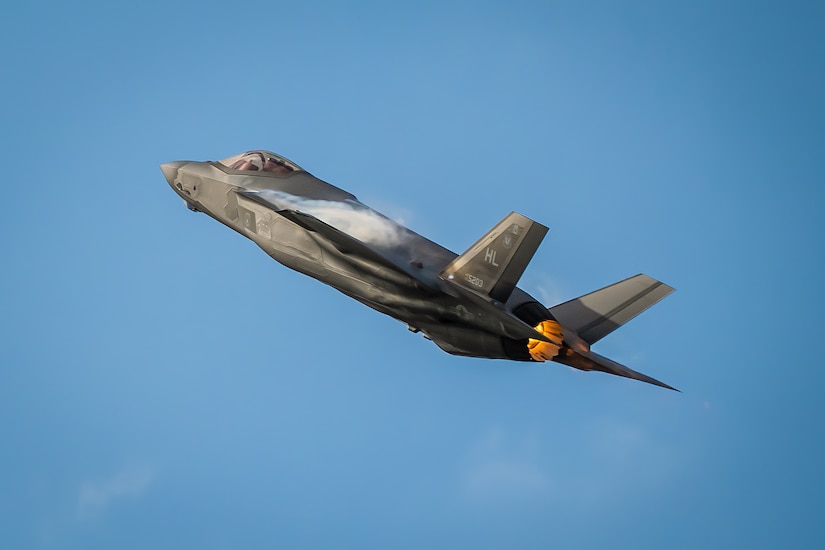 An aircraft from the U.S. Air Force F-35A Lightning II Demo Team, piloted by Maj. Kristin Wolfe, performs an aerial demonstration along the banks of the Ohio River in downtown Louisville, Ky., April 22, 2023, as part of the annual Thunder Over Louisville air show. This year’s event featured more than 20 military and civilian planes, including a C-130J Super Hercules from the Kentucky Air National Guard, which served as the base of operations for military aircraft participating in the show. (U.S. Air National Guard photo by Dale Greer)