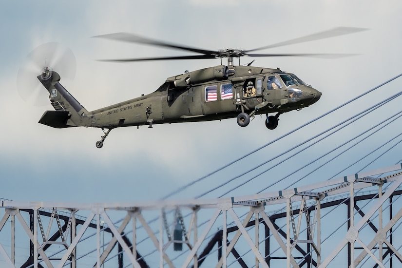 A U.S. Army UH-60 Black Hawk from the 229th Aviation Regiment at Fort Knox, Ky., performs an aerial demonstration along the banks of the Ohio River in downtown Louisville, Ky., April 22, 2023, as part of the annual Thunder Over Louisville air show. This year’s event featured more than 20 military and civilian planes, including a C-130J Super Hercules from the Kentucky Air National Guard, which served as the base of operations for military aircraft participating in the show. (U.S. Air National Guard photo by Dale Greer)