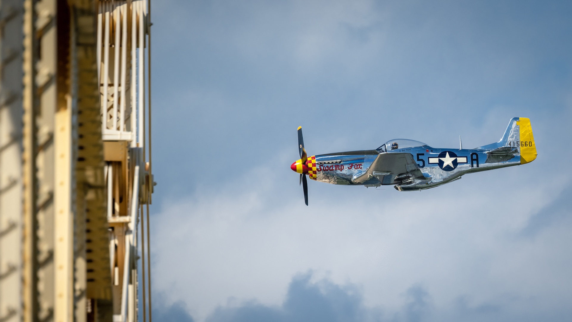 The “Swamp Fox,” a restored U.S. Air Force P-51 Mustang, performs an aerial demonstration along the banks of the Ohio River in downtown Louisville, Ky., April 22, 2023, as part of the annual Thunder Over Louisville air show. This particular aircraft was once assigned to the Kentucky Air National Guard and saw many years of service in the 1940s and ’50s. (U.S. Air National Guard photo by Dale Greer)