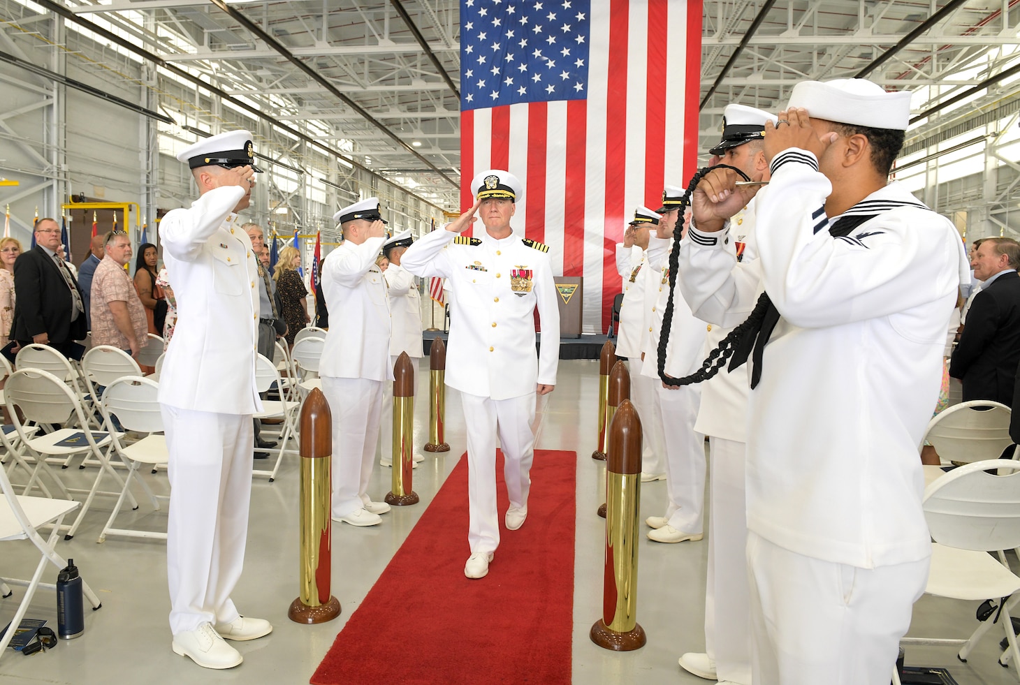230421-N-DG679-007
JACKSONVILLE, Fla. (Apr. 21, 2023) Capt. Grady Duffey is piped ashore for the last time during the Fleet Readiness Center Southeast (FRCSE) change of command ceremony. Capt. William Palmer became FRCSE’s 45th commanding officer after relieving Capt. Grady Duffey during a change of command and retirement ceremony April 21st onboard Naval Air Station Jacksonville. (U.S. Navy photo by Toiete Jackson/Released)