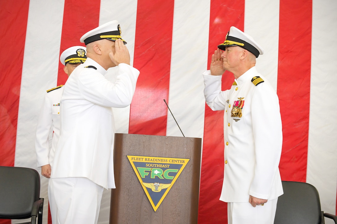230421-N-DG679-004
JACKSONVILLE, Fla. (Apr. 21, 2023) (L-R) Capt. William Palmer salutes and assumes command from Capt. Grady Duffey during the Fleet Readiness Center Southeast (FRCSE) change of command ceremony. Capt. William Palmer became FRCSE’s 45th commanding officer after relieving Capt. Grady Duffey during a change of command and retirement ceremony April 21st onboard Naval Air Station Jacksonville. (U.S. Navy photo by Toiete Jackson/Released)
