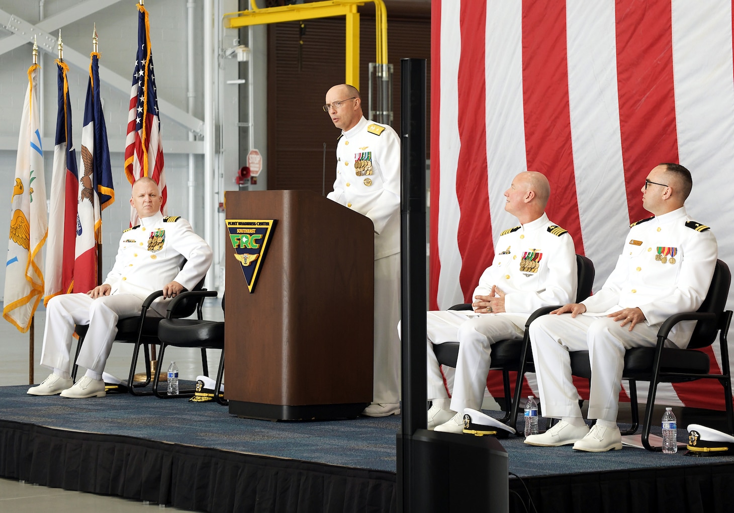 230421-N-DG679-002
JACKSONVILLE, Fla. (Apr. 21, 2023) Rear Adm. Joseph Hornbuckle, commander, Fleet Readiness Centers speaks during the Fleet Readiness Center Southeast (FRCSE) change of command ceremony. Capt. William Palmer became FRCSE’s 45th commanding officer after relieving Capt. Grady Duffey during a change of command and retirement ceremony April 21st onboard Naval Air Station Jacksonville. (U.S. Navy photo by Toiete Jackson/Released)