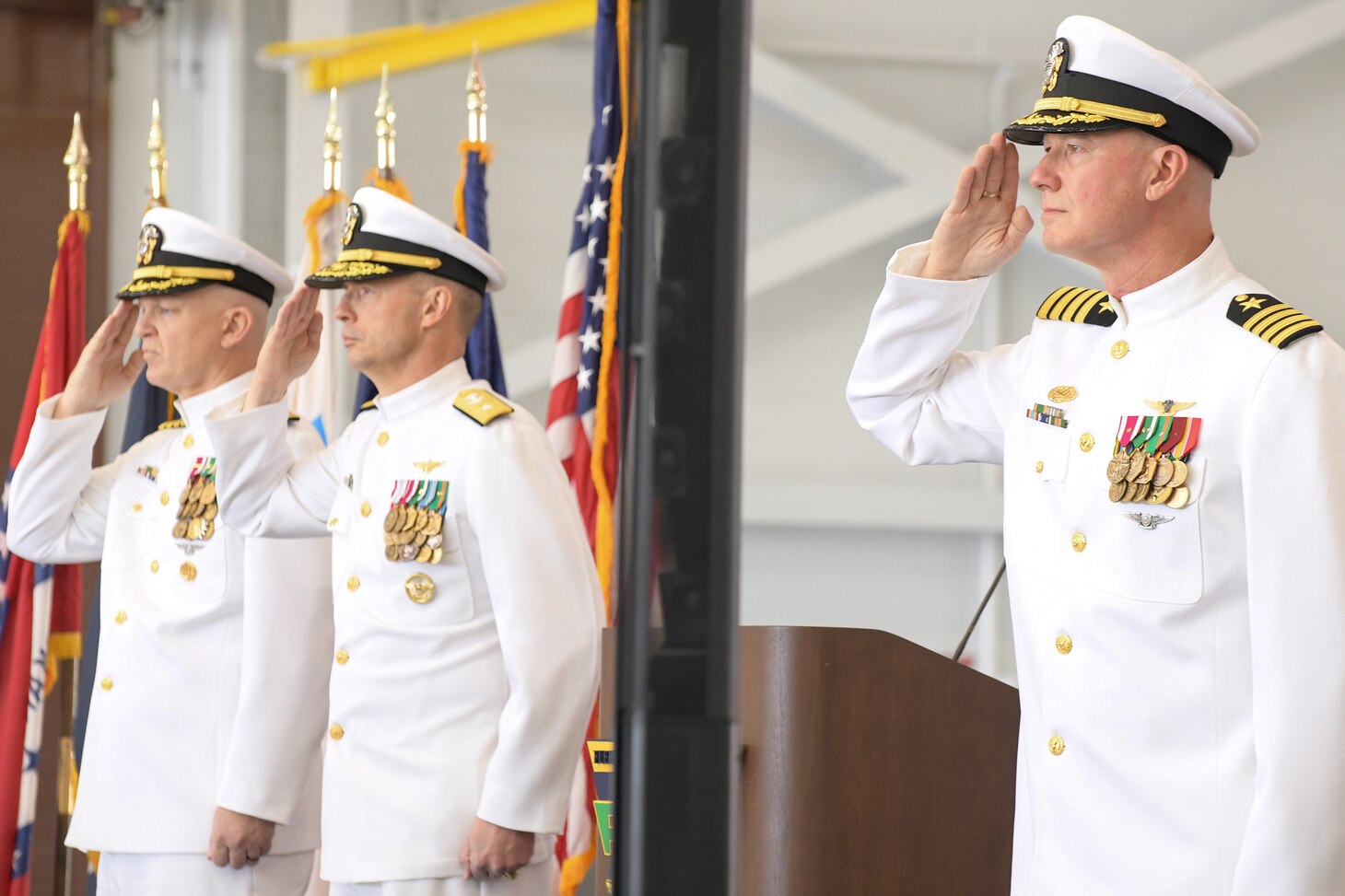 230421-N-DG679-001
JACKSONVILLE, Fla. (Apr. 21, 2023) (L-R) Capt. William Palmer, Rear Adm. Joseph Hornbuckle and Capt. Grady Duffey salute the national ensign during the Fleet Readiness Center Southeast (FRCSE) change of command ceremony. Capt. William Palmer became FRCSE’s 45th commanding officer after relieving Capt. Grady Duffey during a change of command and retirement ceremony April 21st onboard Naval Air Station Jacksonville. (U.S. Navy photo by Toiete Jackson/Released)
