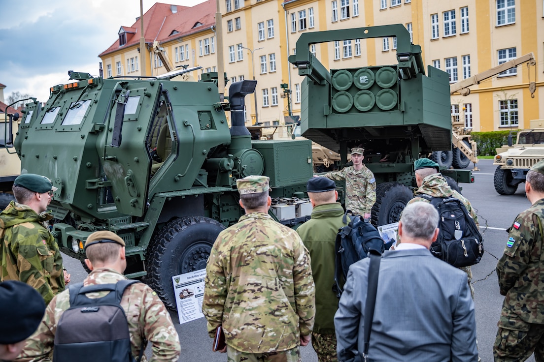 U.S. and NATO senior military leaders receive a tour of the M142 High Mobility Artillery Rocket System during the European Rocket Artillery Summit in Toruń, Poland, April 18, 2023. The 4th Infantry Division’s mission in Europe is to engage in multinational training and exercises across the continent, working alongside NATO allies and regional security partners to provide combat-credible forces to V Corps, America’s forward deployed corps in Europe. (U.S. Army National Guard photo by Sgt. John Schoebel)