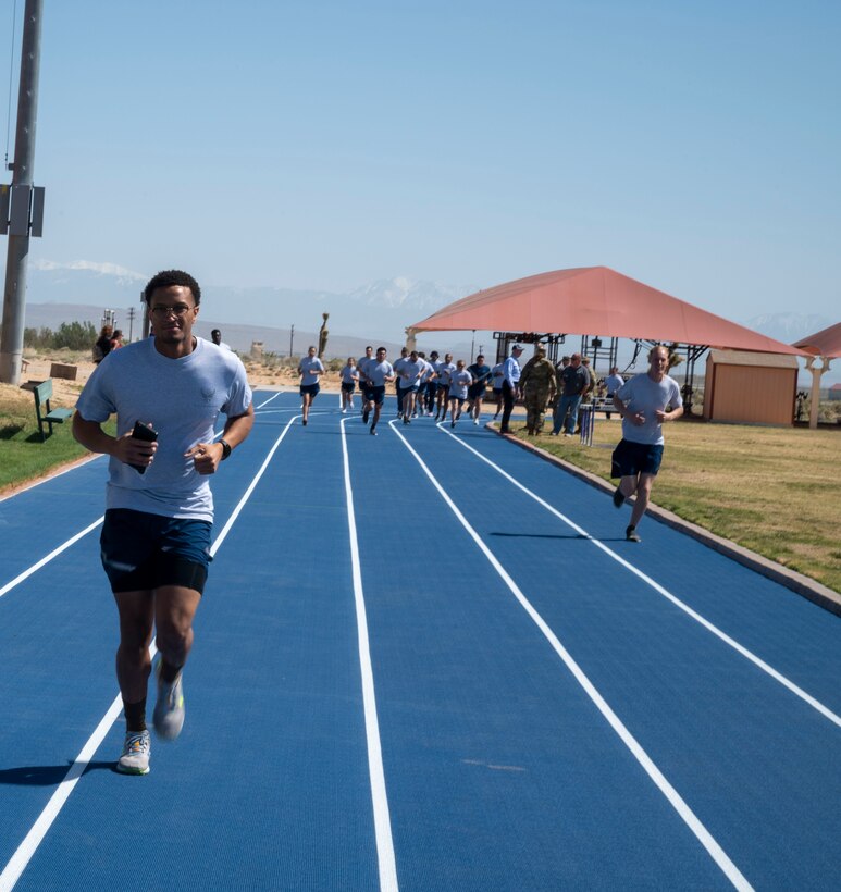 Edwards AFB Airmen test out the newly unveiled state-of-the-art fitness track during a PT fitness test at Rosburg Fitness Center on Edwards Air Force Base, California, April 24. This is the same track surface used for the 2021 Tokyo Olympics and is known as "the most technologically advanced athletic track in the world."