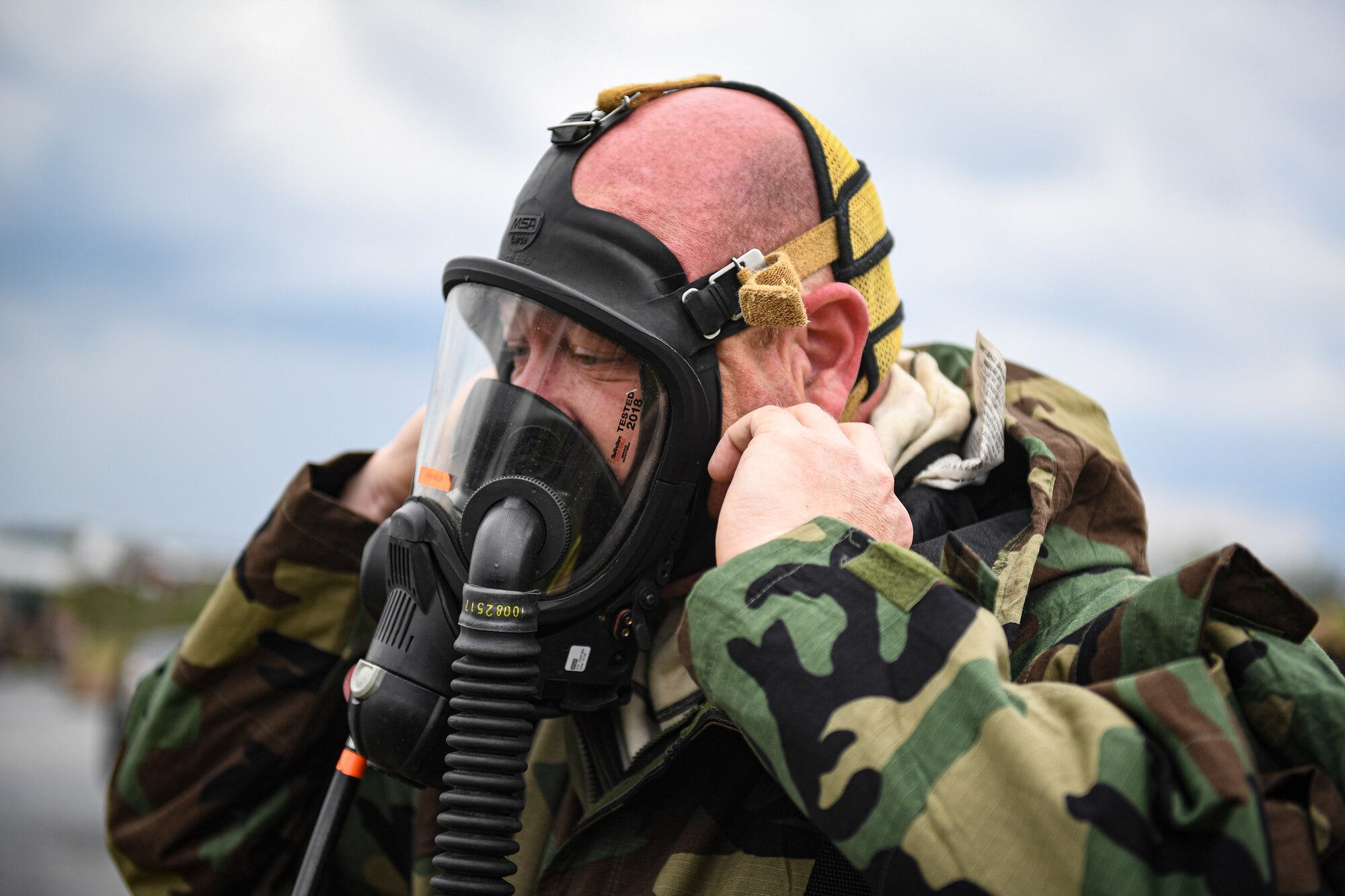 Airmen from the 193rd Special Operations Wing don their mission-oriented protective posture gear, during chemical, biological, radiological, and nuclear training at Fort Indiantown Gap, Pennsylvania, April 15, 2023.