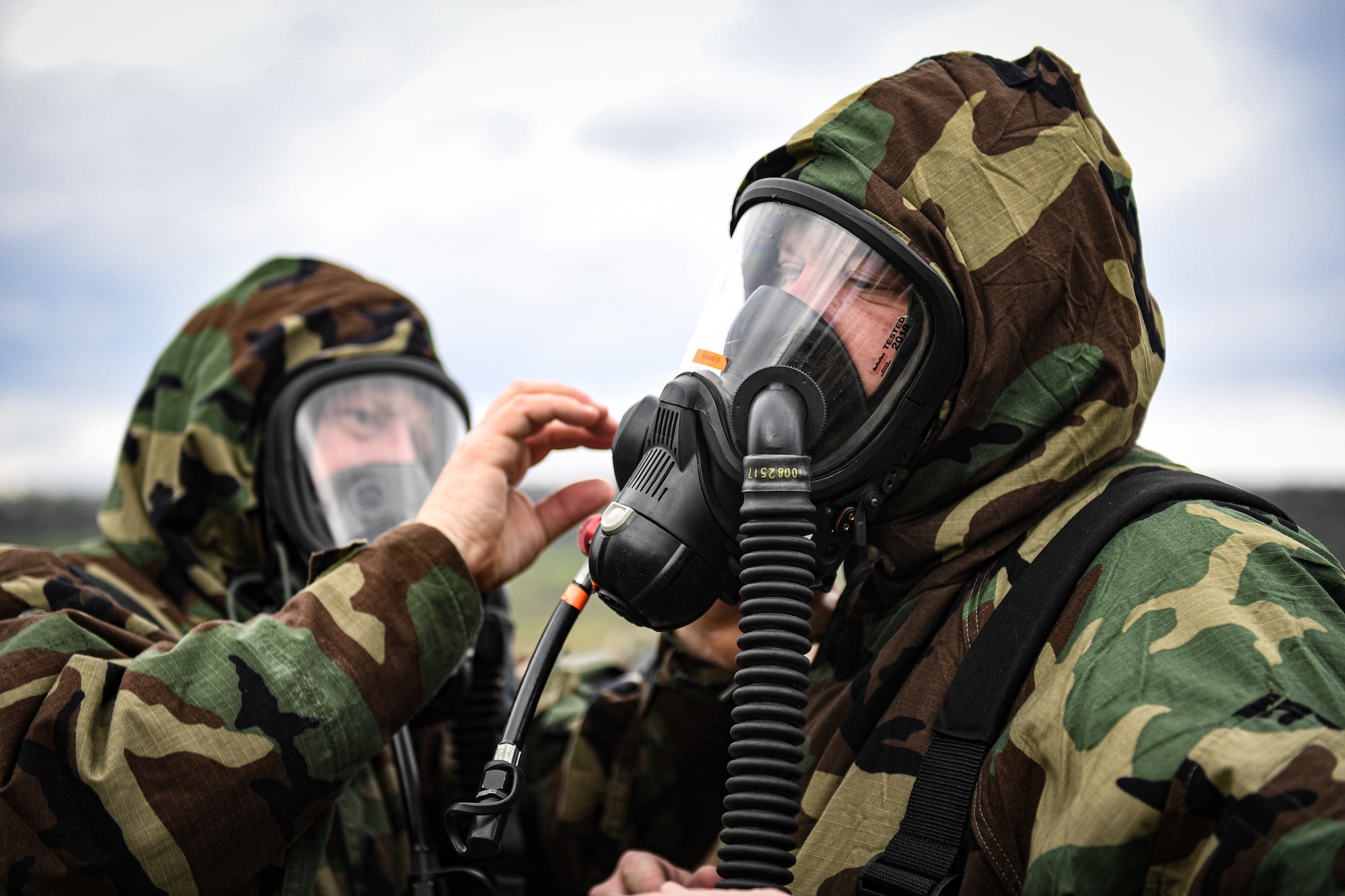 Airmen from the 193rd Special Operations Wing don their mission-oriented protective posture gear, during chemical, biological, radiological, and nuclear training at Fort Indiantown Gap, Pennsylvania, April 15, 2023.