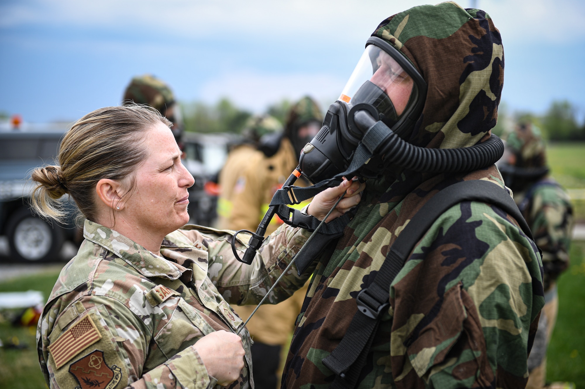 Airmen from the 193rd Special Operations Wing don their mission-oriented protective posture gear, during chemical, biological, radiological, and nuclear training at Fort Indiantown Gap, Pennsylvania, April 15, 2023.