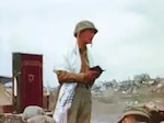 Faded color image of Chaplain Lt. Roland Gittelsohn in the field at Iwo Jima. (Findagrave.com)