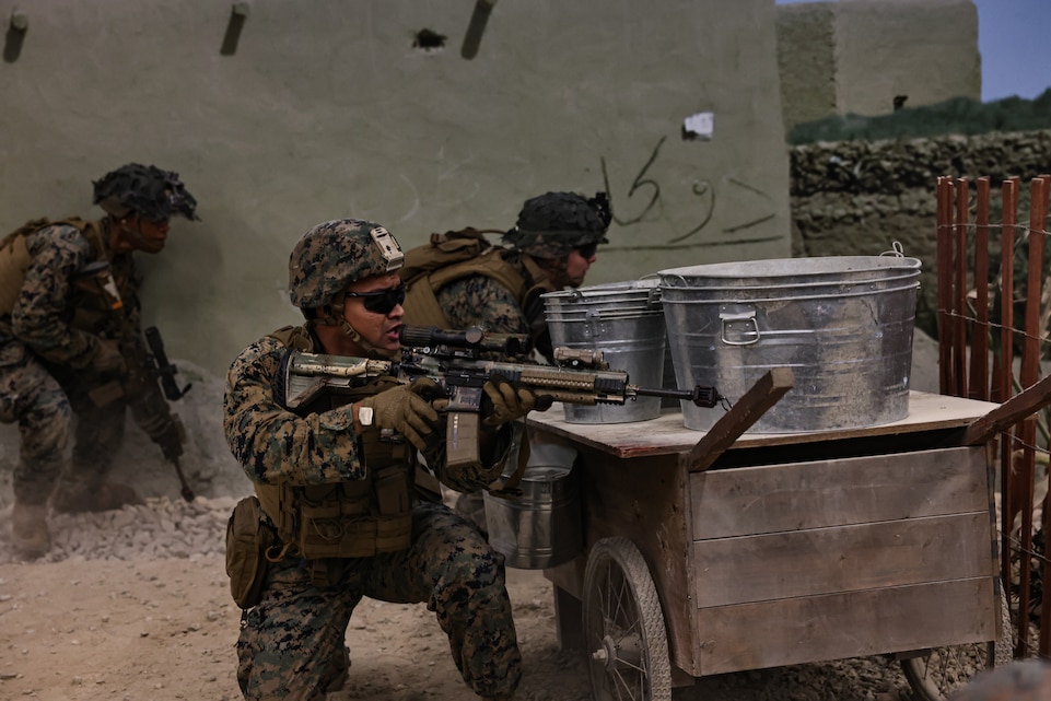 U.S. Marines with India company, 3rd Battalion, 2nd Marines, conduct training at the Infantry Immersion Trainer site on Marine Corps Base Camp Lejeune, North Carolina, April 4, 2023. The IIT is designed to provide Marines with a realistic combat environment using sound, smell, atmospherics and role-players to increase combat efficiency.