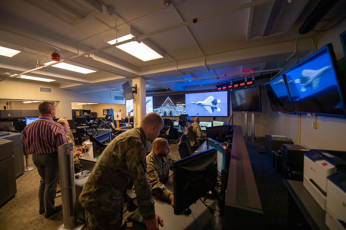 Airmen from the 608th Air Operations Center at Barksdale AFB, La., track and monitor bomber activity on the Combat Operations Division floor during exercise Global Thunder, April 18, 2023.
