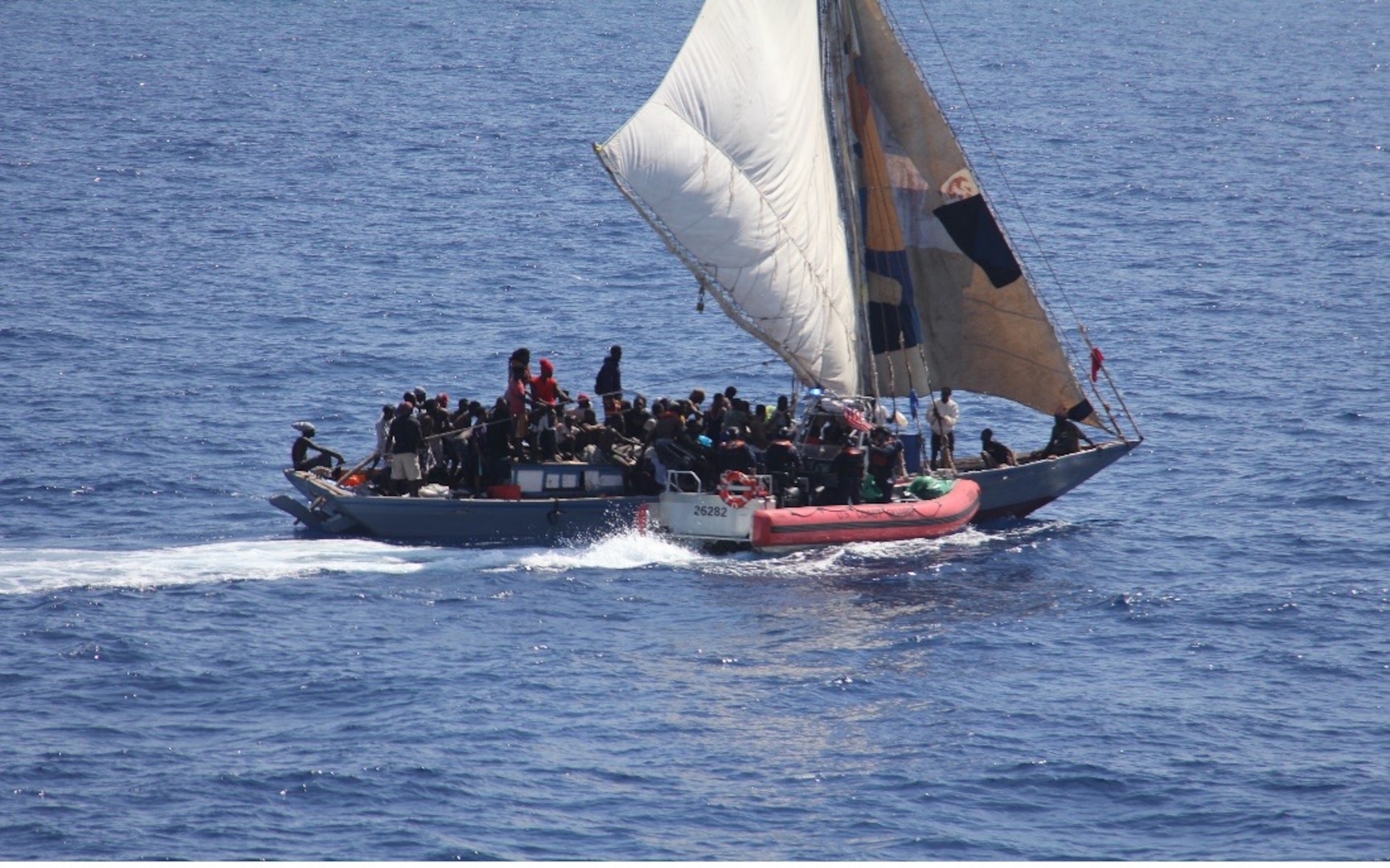 USCGC Tampa’s (WMEC 902) crew interdicts a 50-foot Haitian sail freighter, March 5, 2023 in the Atlantic Ocean. During the patrol, Tampa’s crew contributed to the interdiction, care and repatriation of 428 migrants from Haiti, Cuba and the Dominican Republic. (U.S. Coast Guard photo by Petty Officer 1st Class Aaron Christie)