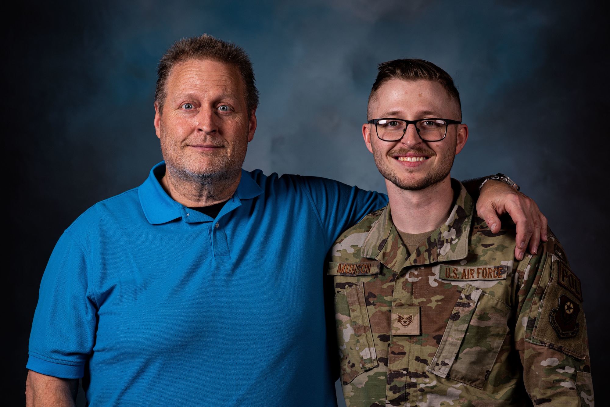 U.S. Air Force Staff Sgt. Nicholas Munson, 27th Special Operations Logistics Readiness Squadron fuels distribution supervisor (right), poses for a photo with his father, Nathan Munson (left), at Cannon Air Force Base, N.M., March 15, 2023. Nicholas Munson worked with his squadron leadership and medical team to find a way to donate his kidney to his father. (U.S. Air Force photo by Senior Airman Vernon R. Walter III)