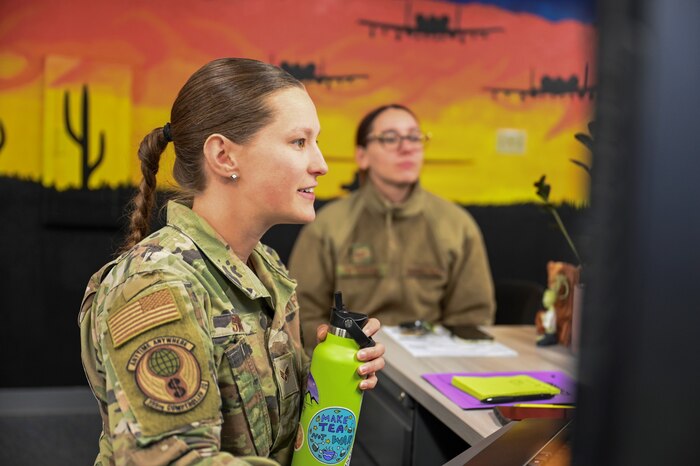 Senior Airman Briana Swesey, 355th Comptroller Squadron special actions technician, assists a customer at Davis-Monthan Air Force Base, Ariz., April 5, 2023. Customer service is key while ensuring proper pay disbursement to DM personnel. (U.S. Air Force photo by Airman 1st Class Devlin Bishop)