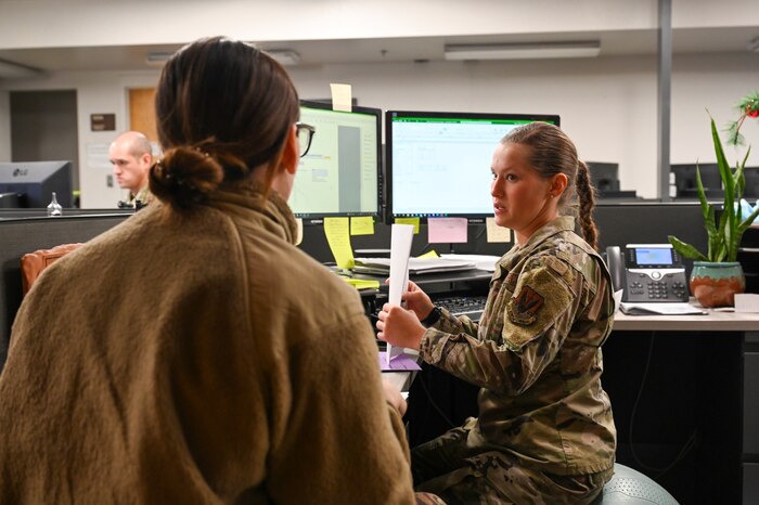 Senior Airman Briana Swesey, 355th Comptroller Squadron special actions technician, assists a customer at Davis-Monthan Air Force Base, Ariz., April 5, 2023. The 355th Wing finance office provides financial customer service and plays an important role in accomplishing the 355th’s Wing’s mission by executing the wing budget to fund all mission requirements. (U.S. Air Force photo by Airman 1st Class Devlin Bishop)